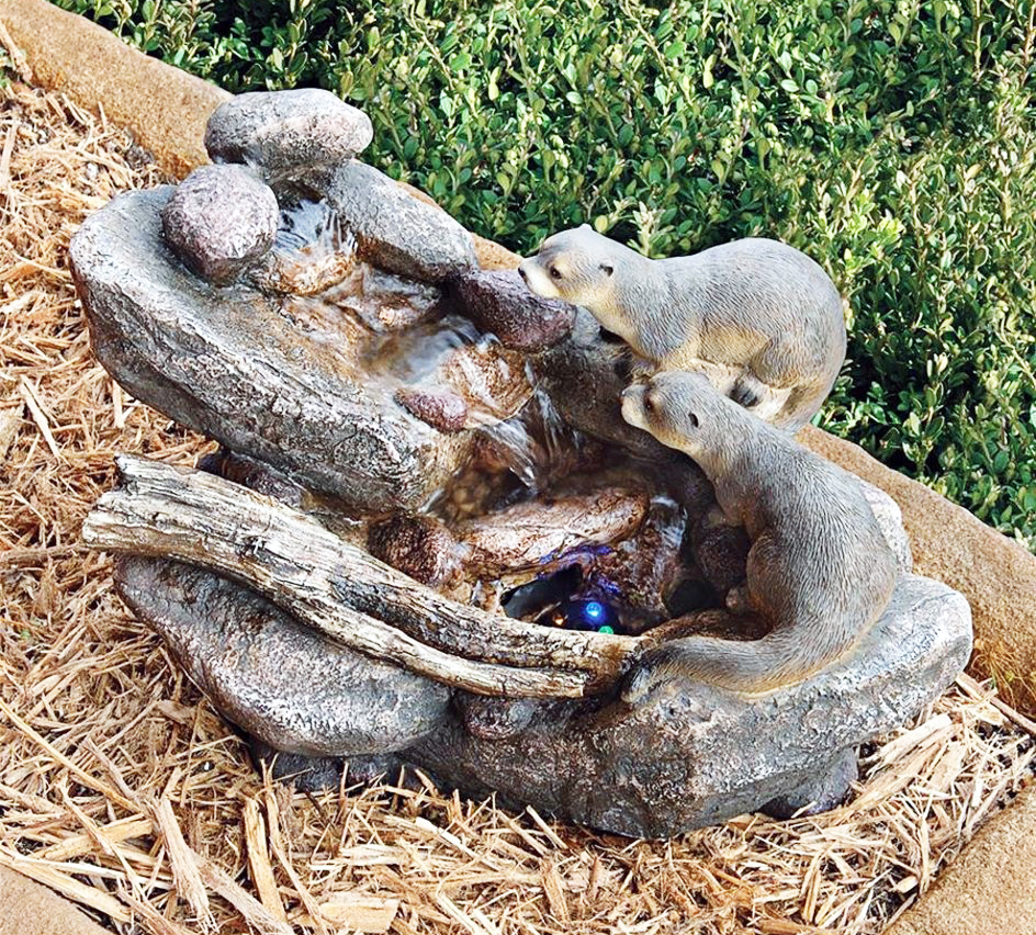 Curious Sea Otters Fountain