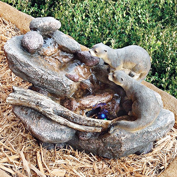 Curious Sea Otters Fountain